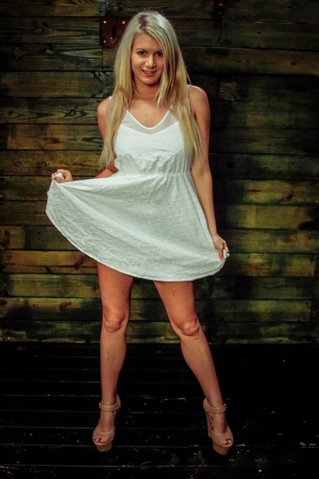 Blond sub Layla Price is restrained before lesbians penetrate her in a dungeon 21920236