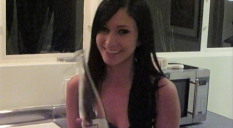 Brunette teen Catie Minx slips an empty bottle inside her horny cunt 42564180