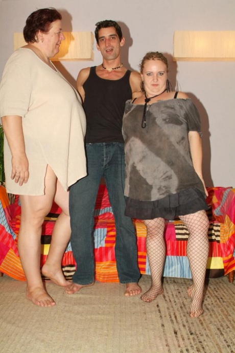 Obese women have a threesome with a willing young man on a sofa 38633476