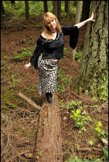 Sexy older woman Tasty Trixie takes a piss while wandering in mature forest 40101916