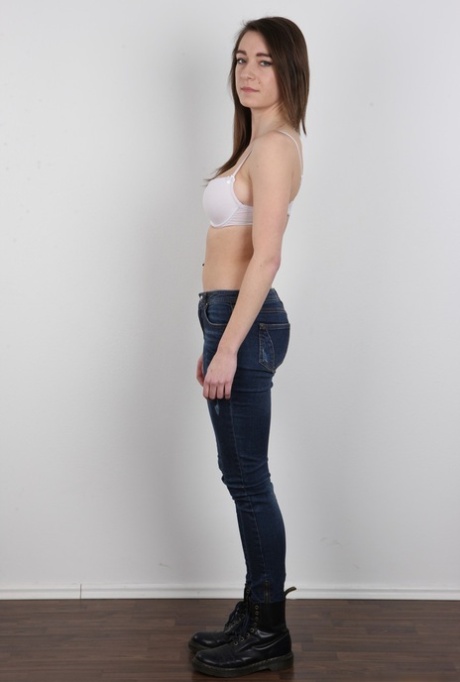 First timer Nikol uncups her natural tits to model topless in black panties 70009688