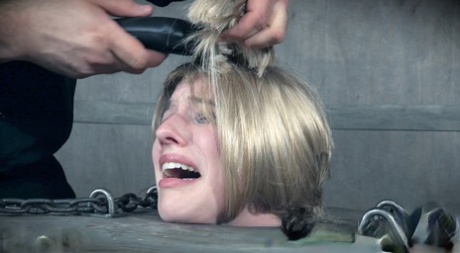 Blonde sex slave Riley Nixon bound in chains for rough BDSM torture session 19222241