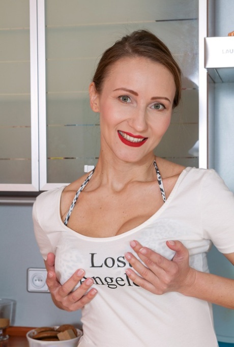 Hot housewife Alena K peels to spread naked ass & masturbate in the kitchen 58478011