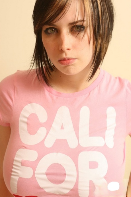 Amateur girl Louisa Lockhart releases her great tits from a t-shirt on a bed 19021633