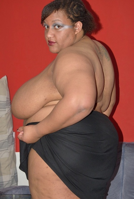 Ebony SSBBW CurvyBunnyB sets loose mega big tits and reveals her massive ass 94028774