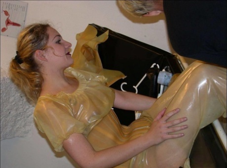 Latex clothed lesbians share a tongue while inside a sauna 37116519
