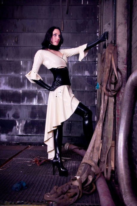 Dark haired chick Dutch Dame poses in latex clothing along with a hood 22483593