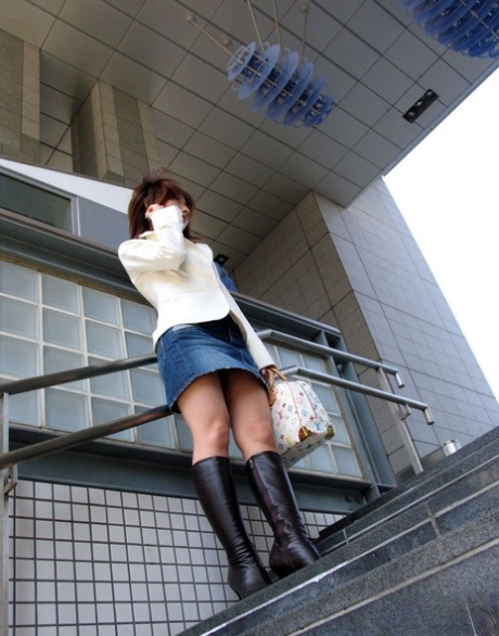 Young Japanese redhead Sayuri ends up completely naked on top of her bed 34611829