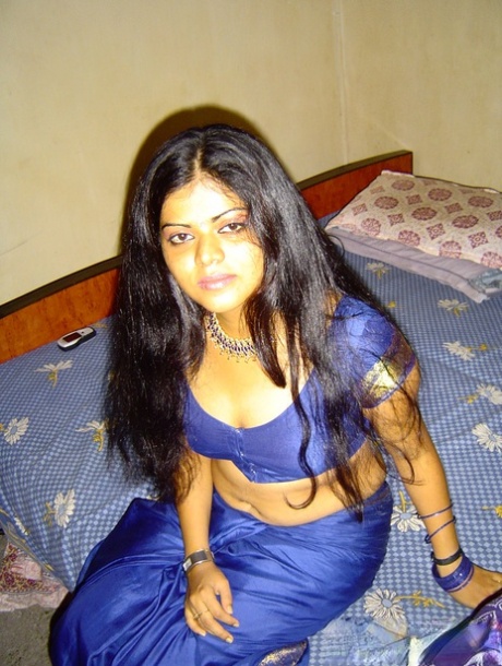 Pretty Indian girl sets her natural tits free of traditional clothing 18740371