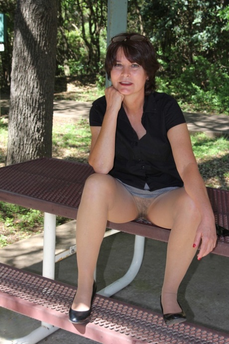 Hot older woman displays her natural pussy in and out of tan pantyhose 17299685