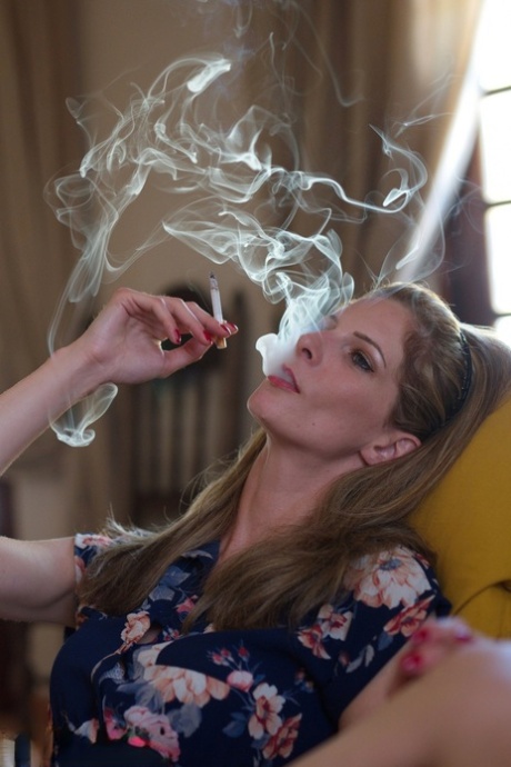 Leggy girl Rebecca Leah exposes her upskirt panties before having a smoke 52882641