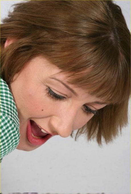 White girl has her black panties pulled down while being spanked over a knee 10348118