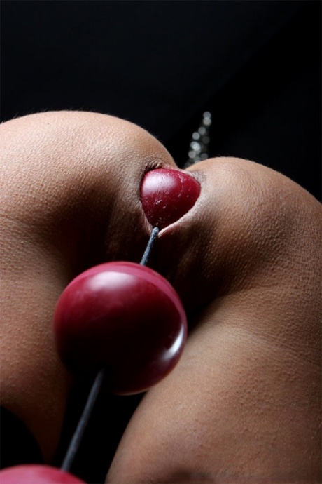 Restrained brunette drools while ball gagged and popping out anal beads 25981211