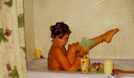 Sexy brunette Deja takes a bath in a highly tempting manner 34799909