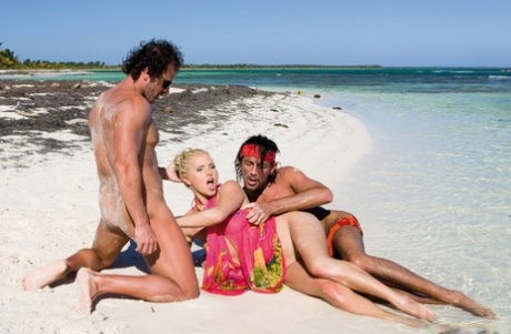Beautiful blonde Kathy Anderson has sex with two men on a beach 68835460