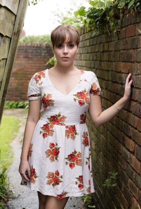 Amateur girl with pierced nipples takes a pee in alleyway between houses 81922844