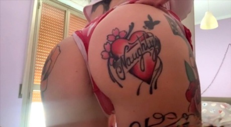 Solo girl Megan Inky displays her heavily tattooed body during SFW action 58866717