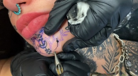 Tattoo enthusiast Amber Luke gets a new face tat from a female artist 75279614