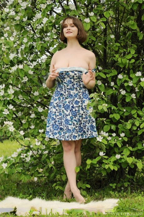 Big titted teen Aurelia Lu sniffs flowers before getting totally naked 16292362