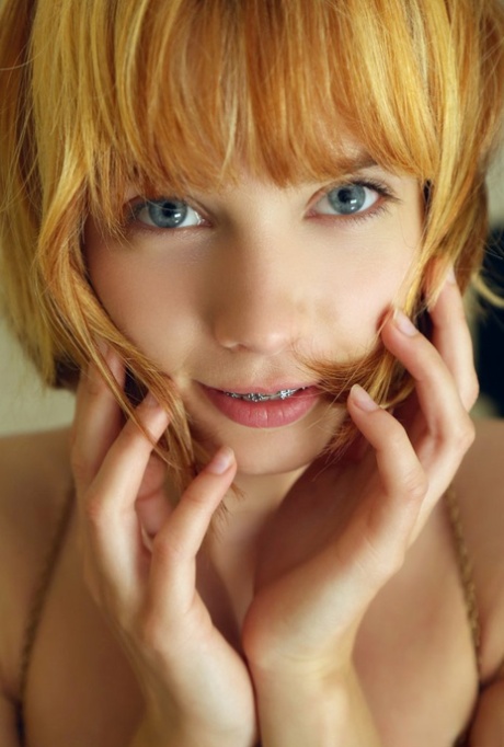 Adorable redhead Lily displays her young girl's body in the nude 95446595