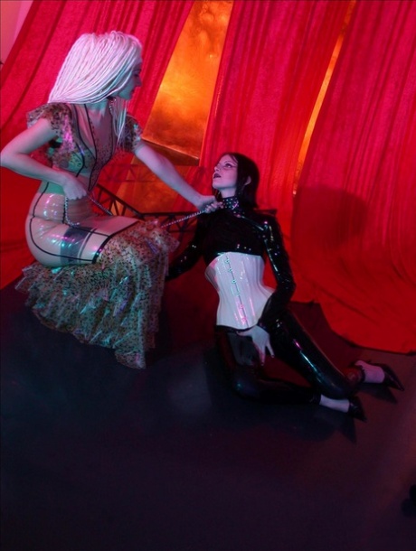 Hot blonde Saskia tops brunette chick TGT during lezdom play in latex wear 88944524