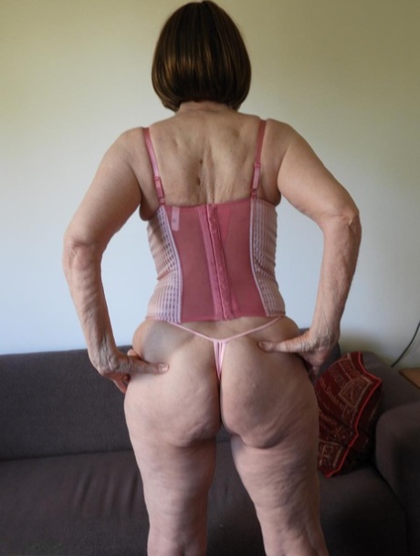 Old woman Kat Kitty discards her lingerie before spreading her naked pussy 15436114