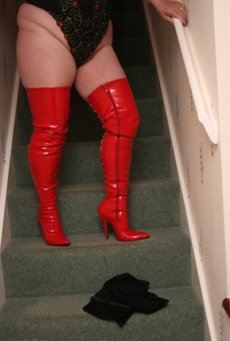 Mature fatty Kinky Carol shows her big tits and snatch in thigh-high boots 79442800