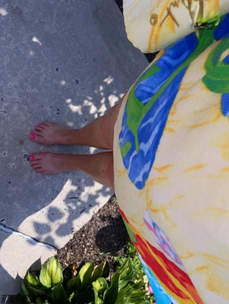 Older lady Busty Bliss shows her natural tits out behind her house 38691268