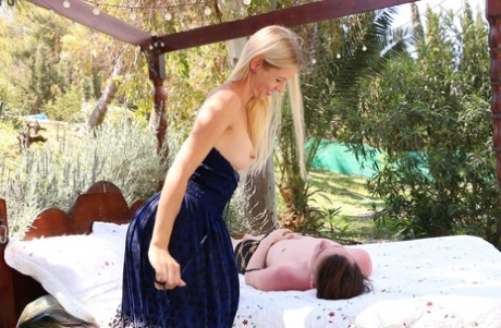 Blonde MILF Lynna Nilsson gets on top of her stepson's face on an outdoor bed 33180368