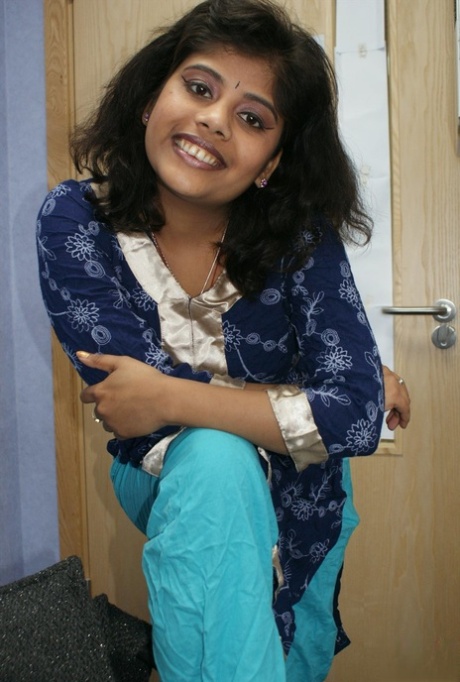 Chubby Indian female Rupali strips naked for a softcore shoot 66066078