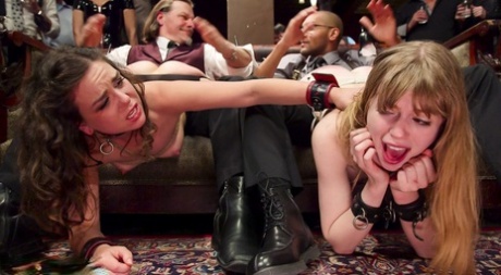 Blonde slave has her screams silenced during a kinky dinner party 46811975