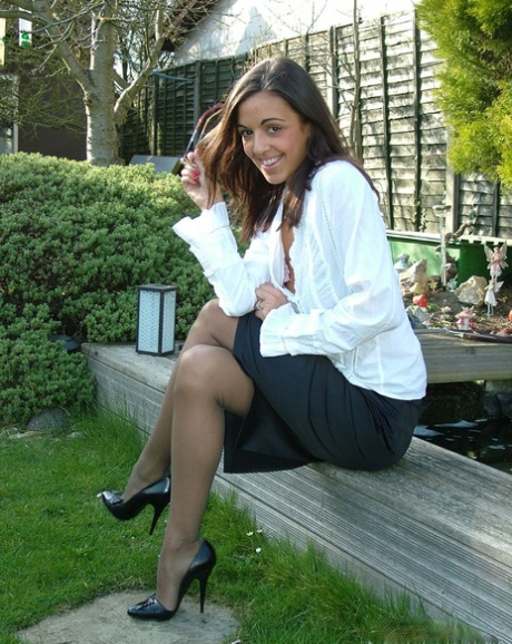 Latina girl Fifi is teasing her long legs while undressing outdoor 63367527
