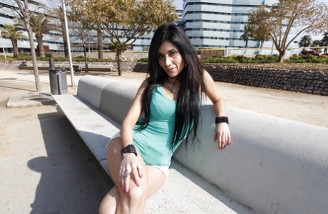 Busty Latina babe Eva Reina flashing her big tits in public 97912766