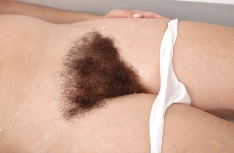 Older Euro lady Elle Macqueen freeing hairy cooter from cotton panties 63260389