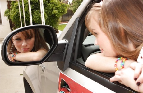 Barely legal teen Capri Anderson flashes tiny tits while taking driver's text 29286500