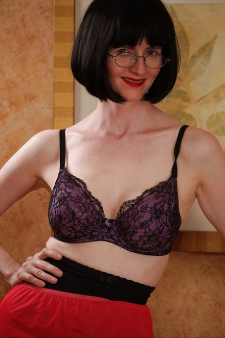 Stunning mature lady stripping and showing off her big tits 23729323