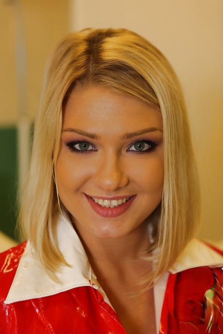 Smiley european nurse in latex uniform revealing her tits and teasing her slit 98691748